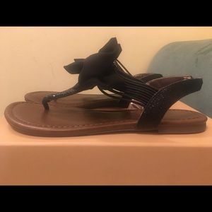 Sandals lightly worn.